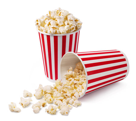 Two striped buckets of popcorn isolated on a white background.の写真素材