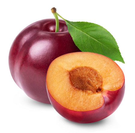 Plum isolated. Ripe red plum and half a plum on a white background.の写真素材