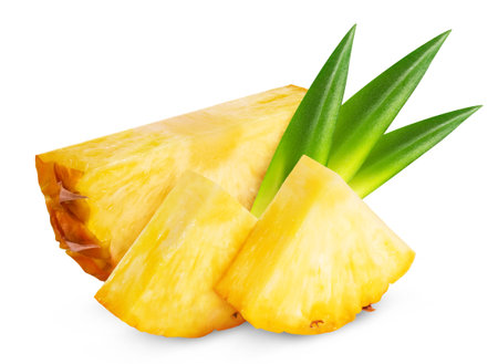 Pineapple isolated. Sliced slices of ripe pineapple with leaves on a white background.の写真素材