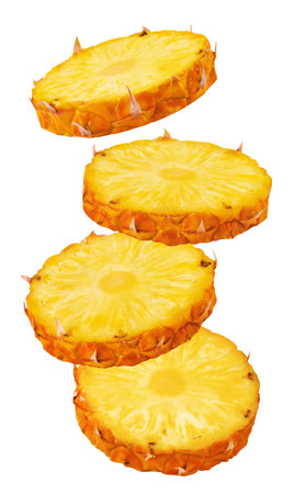 Pineapple isolated. Levitation of ripe pineapple slices on a white background.の写真素材