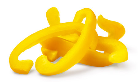 Yellow pepper isolated. Sliced Bulgarian sweet pepper on a white background.の写真素材