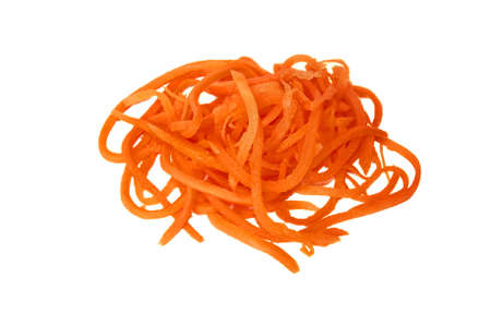 A pile of grated carrots on a white background. Isolate.の写真素材