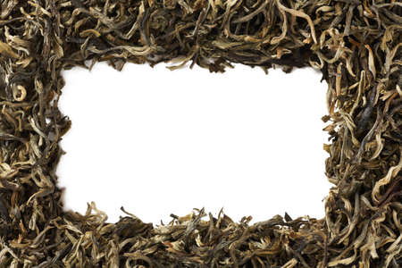 Pile of green tea isolated on white background. Close-up.の写真素材