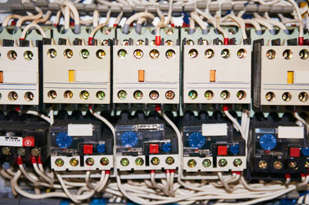 ManyElectrical wires connected to the numbered relays.の写真素材