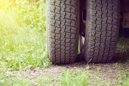 Close up of a truck tire. Abstract background.