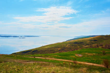Mountain Beach in the fall against the blue sky with clouds.の写真素材