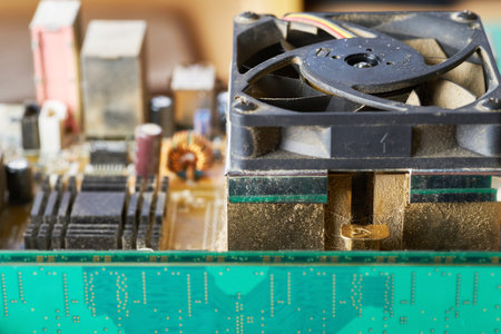 Old motherboard covered in dust and dirt. Close-up.の写真素材