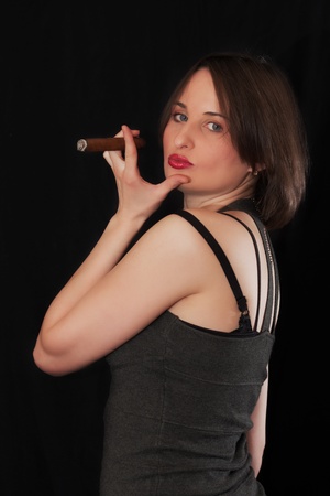 The beautiful woman with a cigarの写真素材