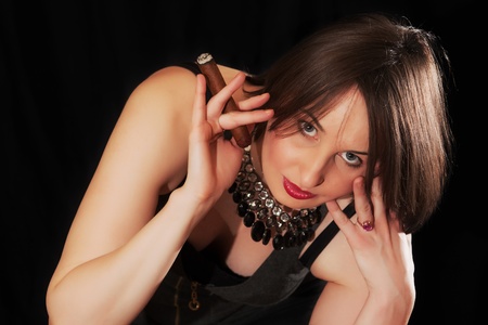 The beautiful woman with a cigarの写真素材