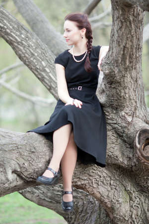 The girl on a treeの写真素材
