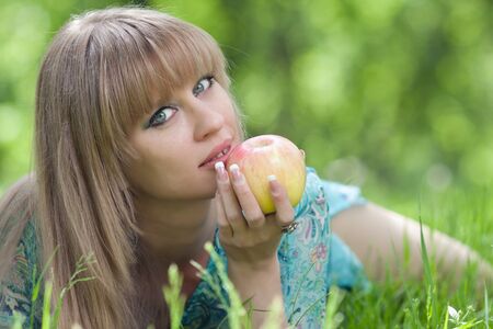 The woman and an appleの写真素材