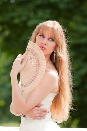 The woman and a fanの写真素材