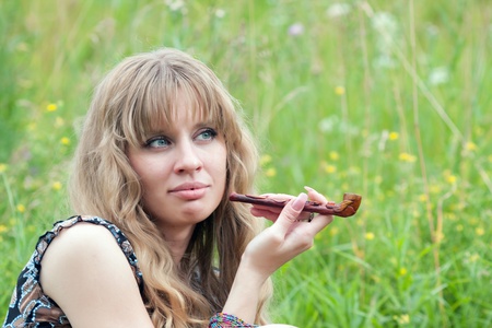 The woman of hippie smokesの写真素材