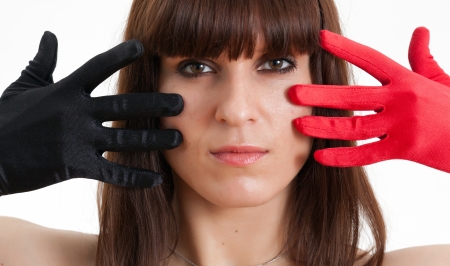 woman holding on to the faceの写真素材