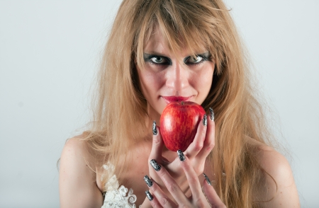 portrait of a woman with an appleの写真素材