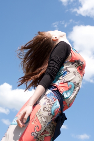 woman on the sky backgroundの写真素材