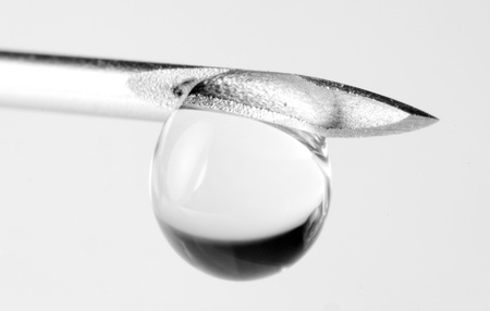 needle, Medical needle with a drop of medicine close-up  Macro photo of the medical needle from the syringeの写真素材