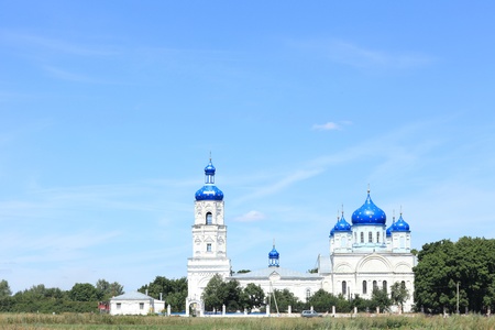 Russian village church against the clear blue skyの写真素材