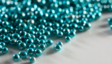 Beautiful small metal balls. Abstract background blue colorの写真素材