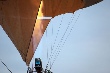 Fire fills Aerostar closeup photo. Inflating balloon.の写真素材
