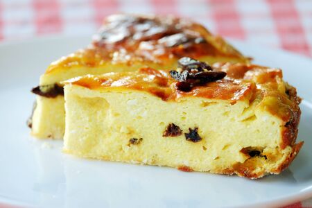 Baked curd in a plate on the tableの写真素材
