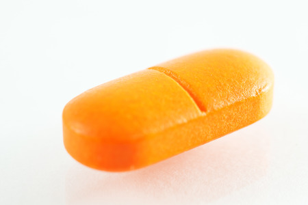 Medical tablet close-up on a white background