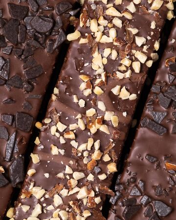 chocolate wafers with nuts and chocolate crumbs close-up