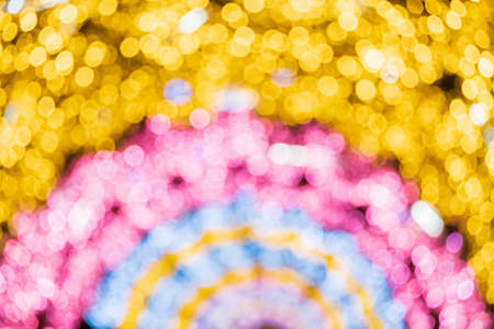 Abstract multicolored bokeh background. Colored glitter vintage lights background