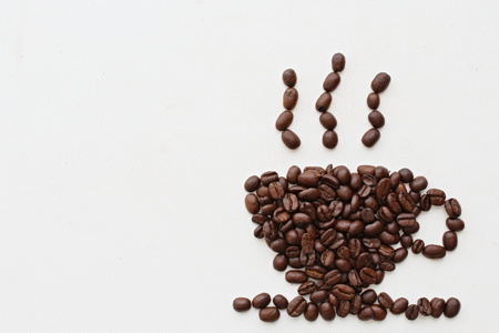 Coffee cup shaped coffee beans.の写真素材