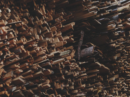 Stacked Firewood with Warm Rustic Textureの写真素材