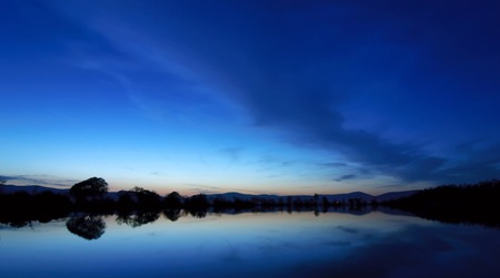 Beautiful spring night on the pond in Crimeaの写真素材