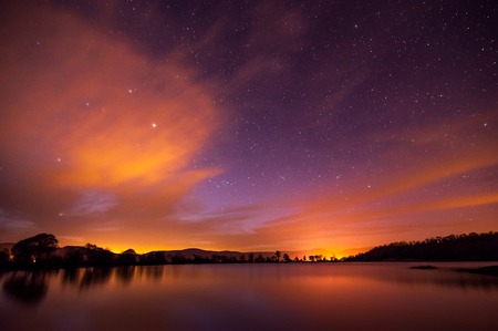 Beautiful spring night on the pond in Crimeaの写真素材