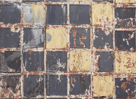 Old dirty colorful tile background. Close-up. Texture