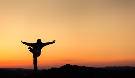 Silhouette of man and beautiful sky. Element of design. Summer sunset. Backgroundの写真素材