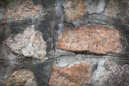 Wall. Natural granite stone texture background. Rough and rusty. Close-up, macroの写真素材