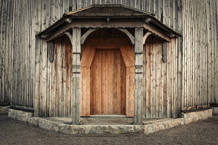 Wooden old door with lock and wall. Background for designの写真素材