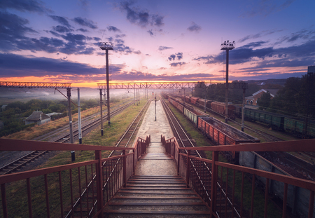 Cargo train platform at sunset. Railroad in Ukraine. Railway station.の写真素材