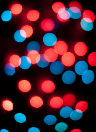 Defocused christmas lights. New Year bokeh. Abstract background for holiday designの写真素材