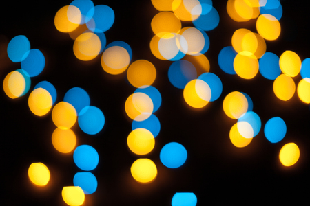 Defocused christmas lights. New Year bokeh. Abstract background for holiday designの写真素材