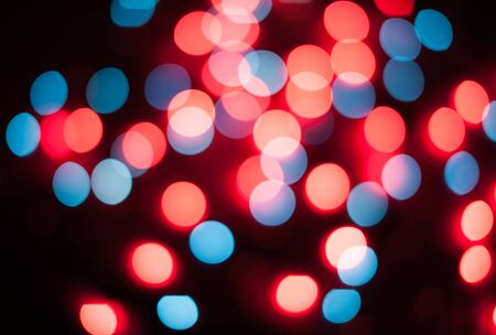 Defocused christmas lights. New Year bokeh. Abstract background for holiday designの写真素材