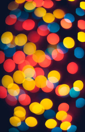 Defocused christmas lights. New Year bokeh. Abstract background for holiday designの写真素材