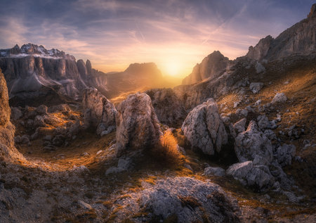 Rocks and stones at colorful sunset in autumn in Dolomites, Italyの写真素材