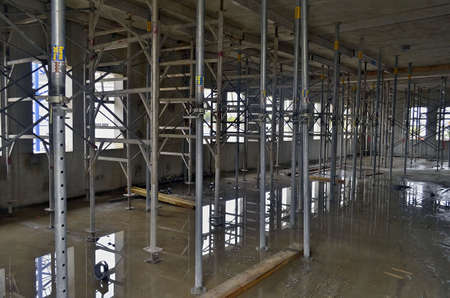 Besançon, France - November 7, 2013: Struts in an empty room on a construction site.のeditorial素材