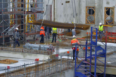 Besançon, France - September 17, 2013: Workmen on a construction site.のeditorial素材