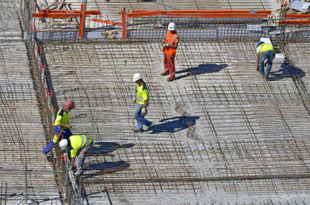 Besançon, France - August 21, 2013: Workmen on a construction site.のeditorial素材