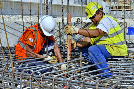 Besançon, France - July 23, 2013: Workmen on a construction site.のeditorial素材