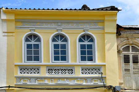 Multicolor facades with Sino-Portuguese architecture in Phuket Town, Thailandの写真素材