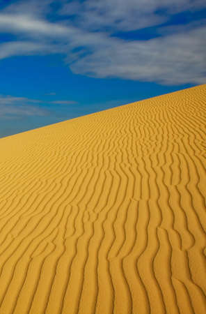A sand dune with fascinating pattern under the hot Vietnam sun.の写真素材
