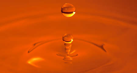 Drop of water captured with high speed macro photo - Orange filter- Shallow depth of field -...