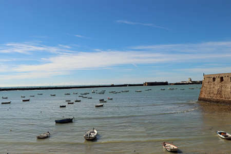 Waterfront with small fishing boats in Spainの写真素材